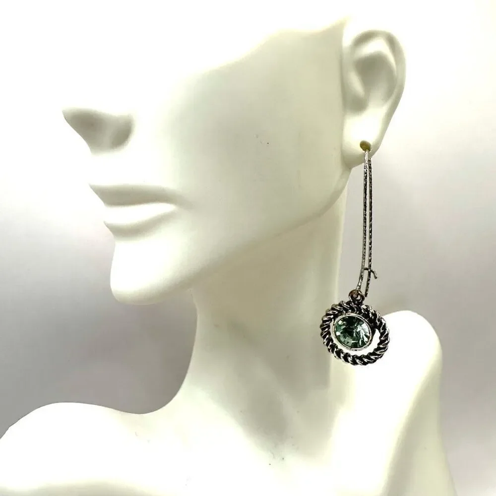 Silver tone green crystal dangling earrings